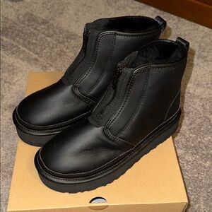 Sleek Black Zippered Boots